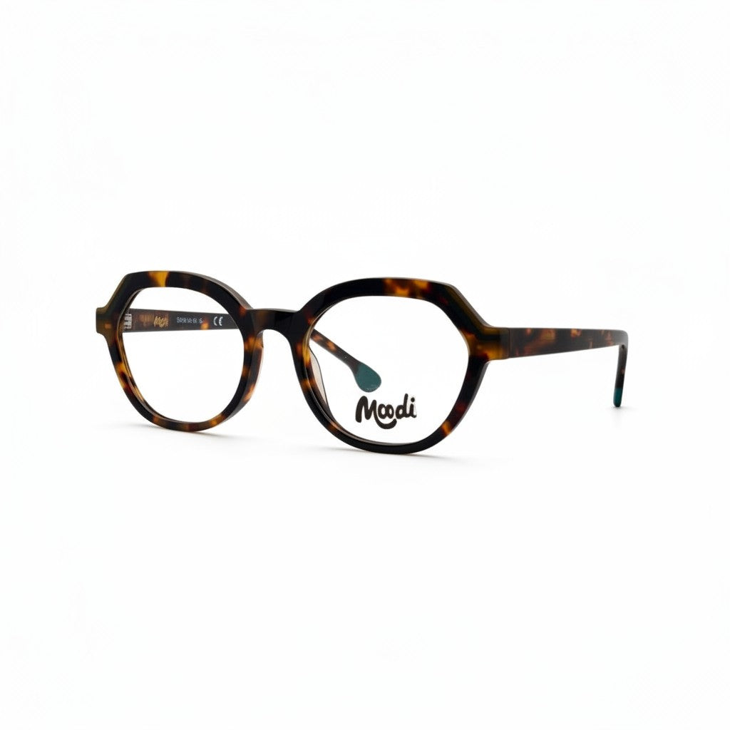 Gafas de vista Moodi Botero de carey con montura geométrica y lentes transparentes.