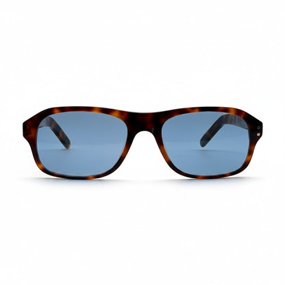 Gafas de sol Moodi Zylo con montura carey y lentes polarizadas azules. Forma rectangular redondeada.