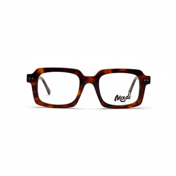 Gafas de vista Moodi Hopper de carey con montura cuadrada y logo en la lente.