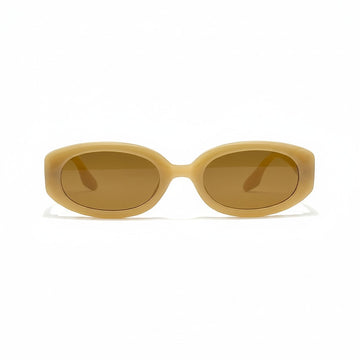 Gafas de sol Moodi Alice de acetato beige cálido con montura ovalada y lentes tintadas.